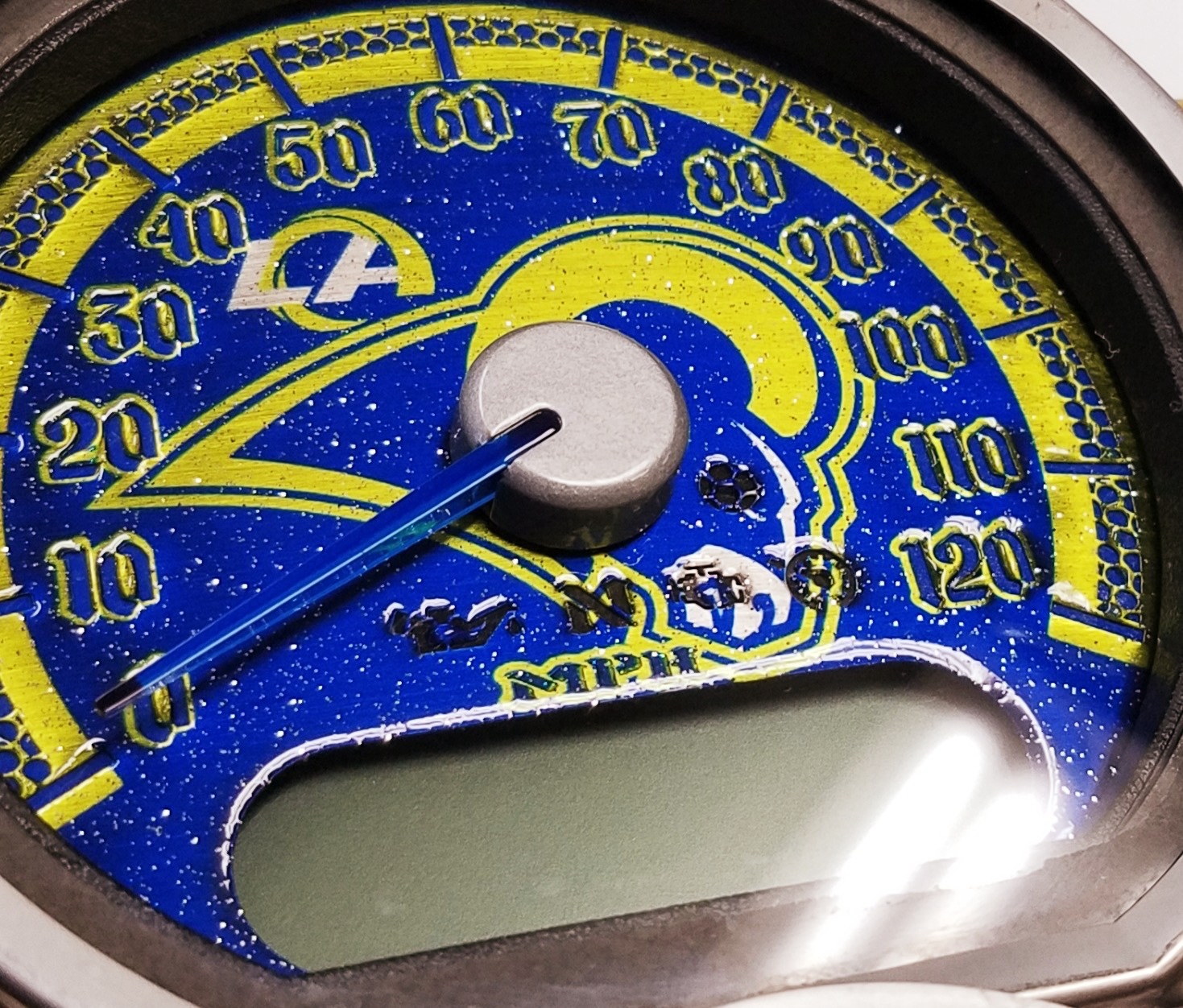 Blue and gold custom Harley gauge