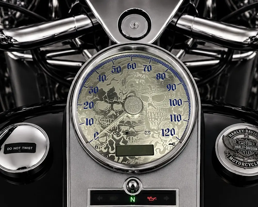 Etched Skulls brushed stainless Road King and Softail gauge
