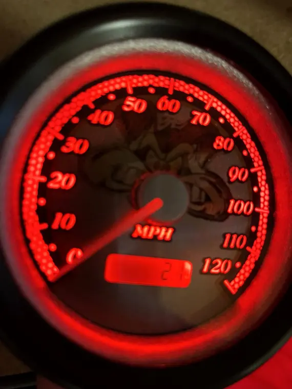 Red illuminated custom Harley speedometer gauge
