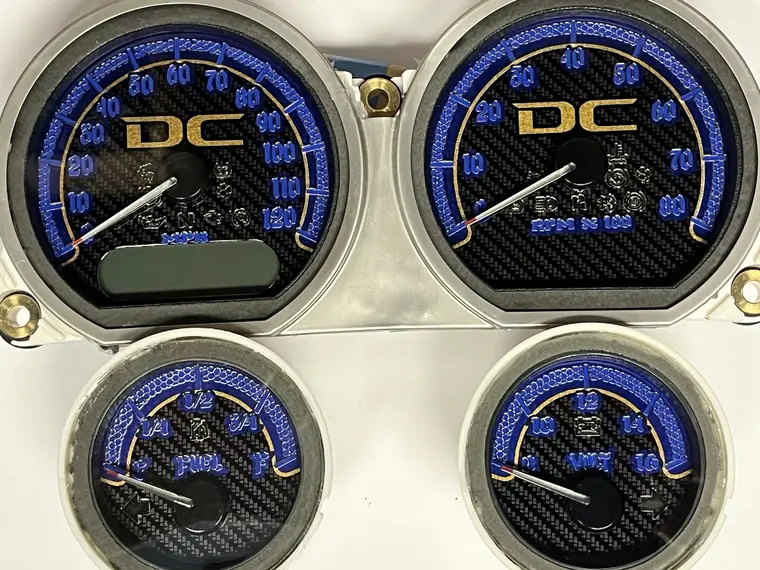 Blue and gold DC custom Harley bagger gauges