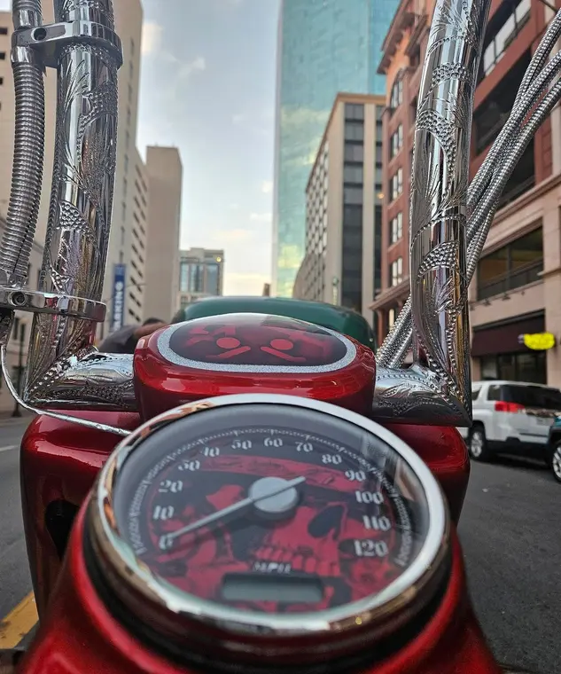Custom Harley tank mounted gauge installed on motorcycle