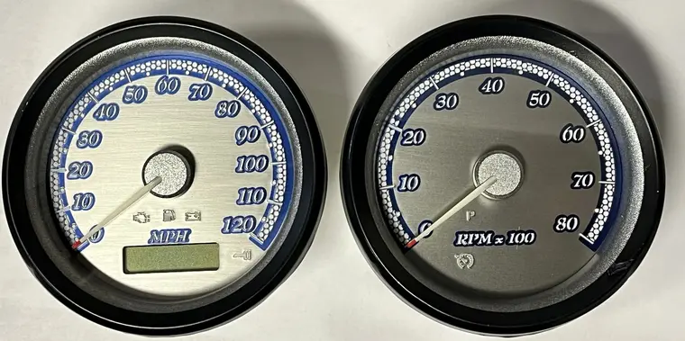 Brushed silver and blue custom Harley gauge pair