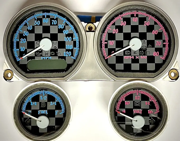 Blue and pink checkerboard custom Harley bagger gauges